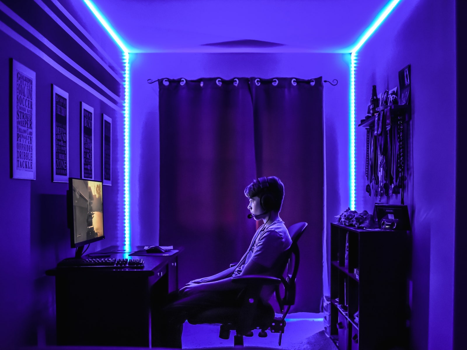kid sitting at gaming PC